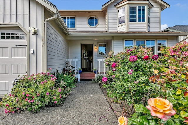 1102 SW 348th Pl, Federal Way, WA 98023 - doorway to property with an attached garage