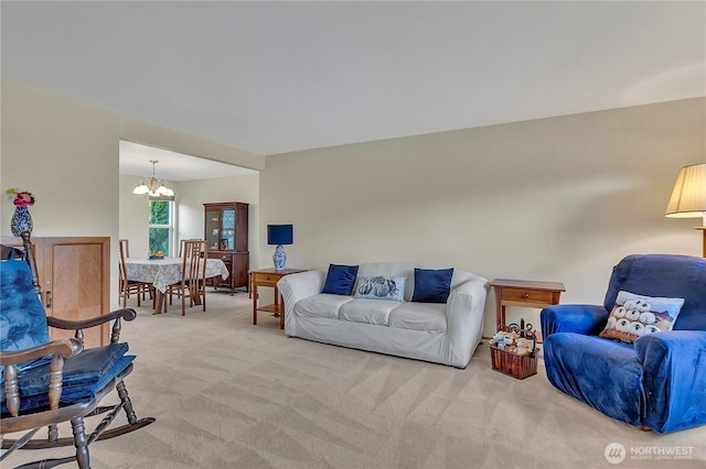 1102 SW 348th Pl, Federal Way, WA 98023 - living room featuring light colored carpet and a chandelier