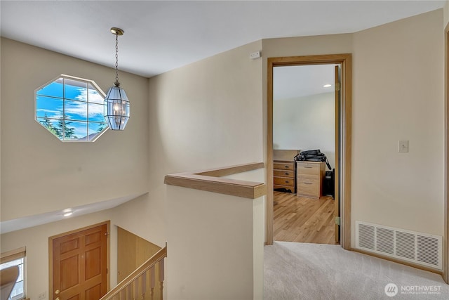 1102 SW 348th Pl, Federal Way, WA 98023 - corridor with an upstairs landing and light wood-type flooring