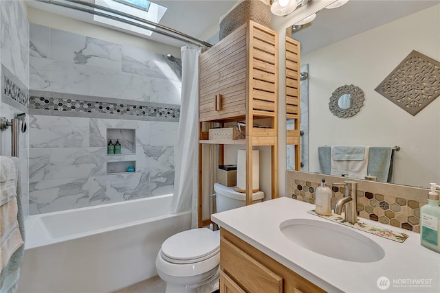 1102 SW 348th Pl, Federal Way, WA 98023 - bathroom featuring shower / bath combination with curtain, toilet, vanity, and a skylight