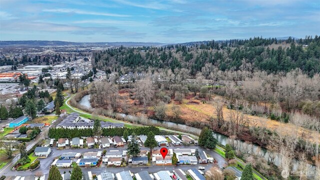 1510 Maple Ln Unit 16, Kent, WA 98030 - aerial view of property and surrounding area featuring a heavily wooded area