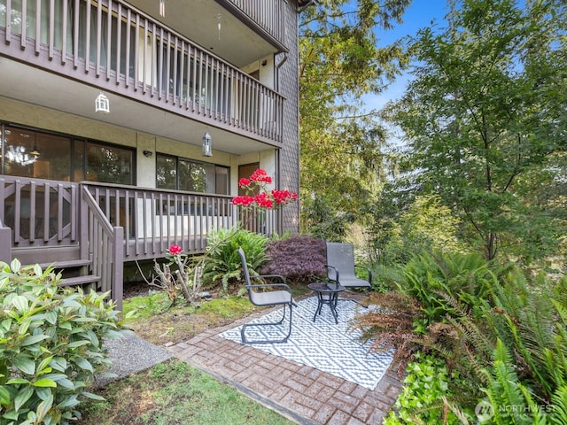 18210 15th Ave NE Unit 101, Shoreline, WA 98155 - view of patio / terrace with a balcony