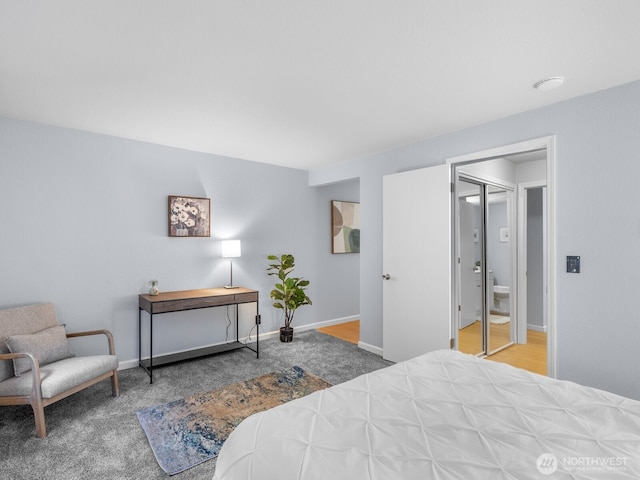 18210 15th Ave NE Unit 101, Shoreline, WA 98155 - carpeted bedroom featuring baseboards
