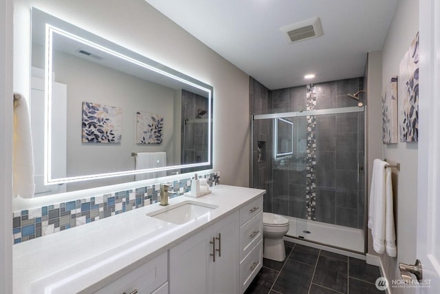 26602 N Rothrock Rd, Prosser, WA 99350 - full bath with vanity, a shower stall, tile patterned floors, and tasteful backsplash