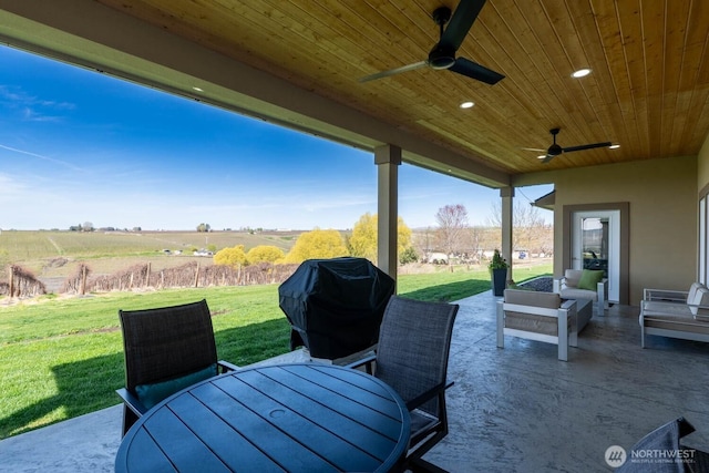 26602 N Rothrock Rd, Prosser, WA 99350 - view of patio / terrace with outdoor dining area, a ceiling fan, grilling area, and a view of countryside