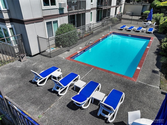 2253 Gilman Dr W Unit 207, Seattle, WA 98119 - community pool with a patio area