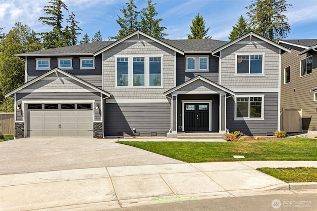 16617 8th Avenue Ct E Unit 9, Spanaway, WA 98387 - craftsman-style home featuring driveway, a front yard, a garage, and a shingled roof