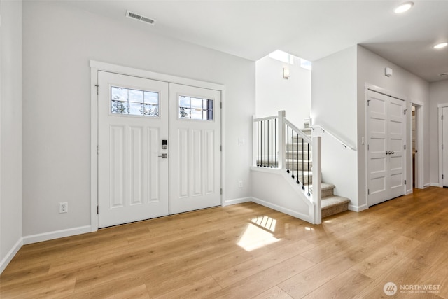 16617 8th Avenue Ct E Unit 9, Spanaway, WA 98387 - entrance foyer featuring light wood-style flooring, stairs, and recessed lighting