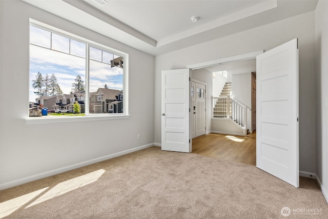 16617 8th Avenue Ct E Unit 9, Spanaway, WA 98387 - unfurnished bedroom with carpet flooring and a raised ceiling