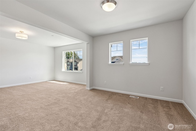 16617 8th Avenue Ct E Unit 9, Spanaway, WA 98387 - carpeted spare room featuring baseboards