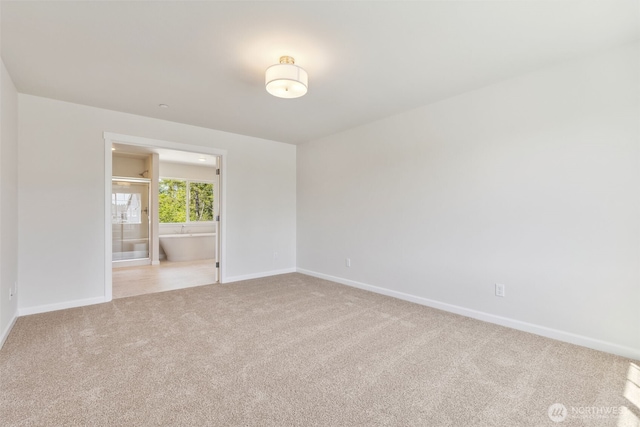 16617 8th Avenue Ct E Unit 9, Spanaway, WA 98387 - empty room with light carpet and baseboards