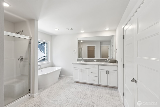 16617 8th Avenue Ct E Unit 9, Spanaway, WA 98387 - bathroom with a shower stall, double vanity, a soaking tub, and recessed lighting