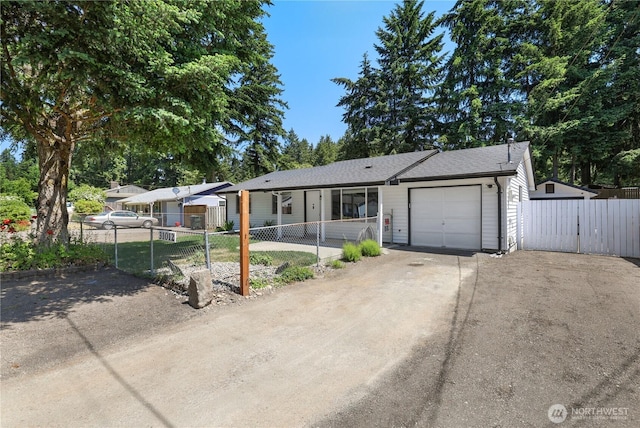 31012 151st Ave SE, Kent, WA 98042 - ranch-style home featuring an attached garage, driveway, and a gate
