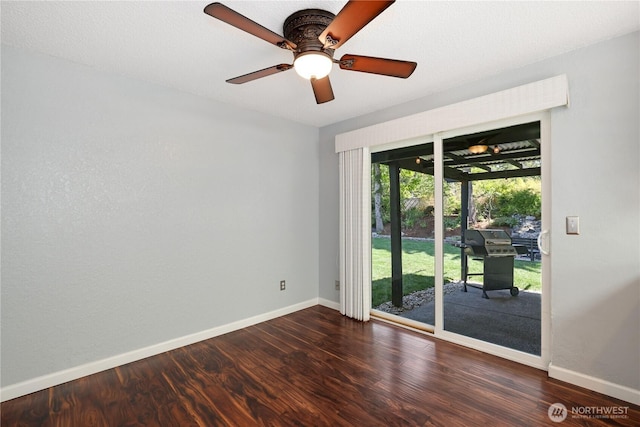 31012 151st Ave SE, Kent, WA 98042 - unfurnished room with baseboards, wood finished floors, and a ceiling fan