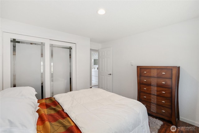 31012 151st Ave SE, Kent, WA 98042 - bedroom featuring dark wood finished floors, a closet, and baseboards