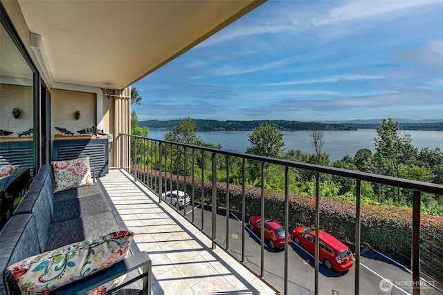 8005 Sand Point Way NE Unit A41, Seattle, WA 98115 - balcony featuring a water view