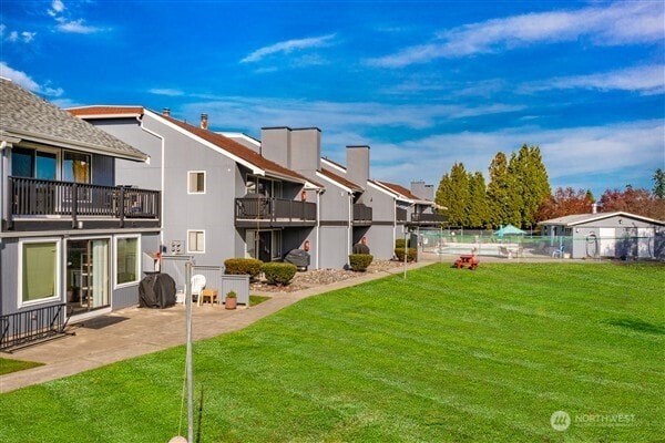 7530 Birch Bay Dr Unit 206, Blaine, WA 98230 - view of yard featuring a balcony and a patio area