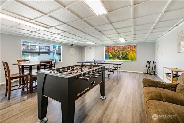 7530 Birch Bay Dr Unit 206, Blaine, WA 98230 - rec room featuring wood finished floors, healthy amount of natural light, and baseboards