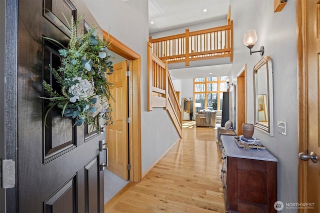 367 E Silverado Ct, Bellingham, WA 98226 - entrance foyer featuring light wood-style floors, stairway, a towering ceiling, recessed lighting, and baseboards