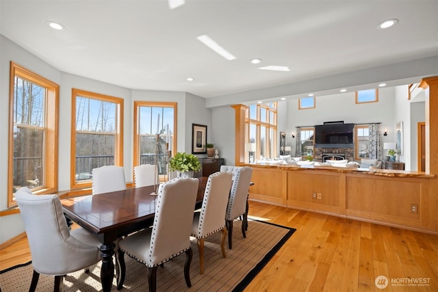 367 E Silverado Ct, Bellingham, WA 98226 - dining area featuring recessed lighting, light wood-style flooring, and a fireplace