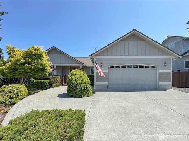 1427 N Aurora Ct, Port Angeles, WA 98363 - view of front of property featuring a garage, concrete driveway, and board and batten siding
