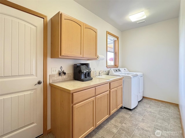 1427 N Aurora Ct, Port Angeles, WA 98363 - washroom featuring washing machine and dryer and baseboards