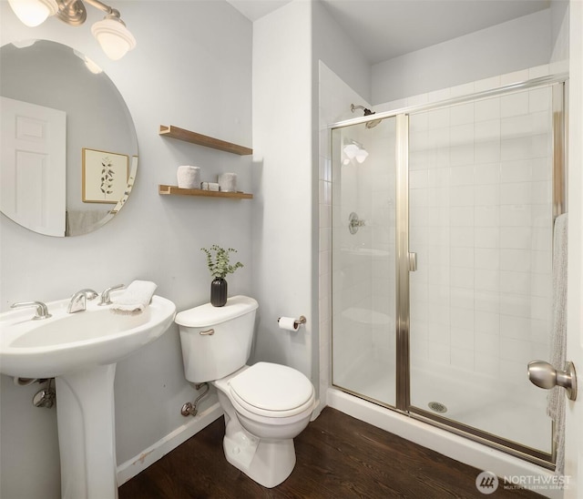 328 210th St SE, Bothell, WA 98021 - full bath featuring toilet, a stall shower, wood finished floors, baseboards, and a sink
