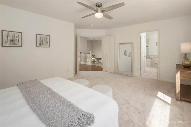 328 210th St SE, Bothell, WA 98021 - carpeted bedroom with ensuite bath and a ceiling fan