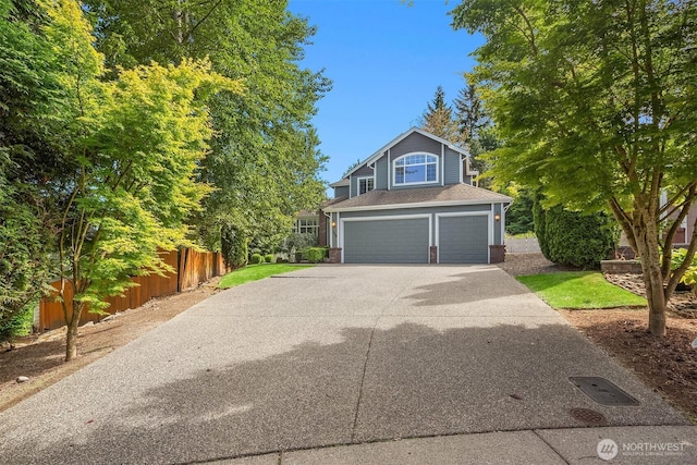 328 210th St SE, Bothell, WA 98021 - traditional-style home with driveway, an attached garage, brick siding, and roof with shingles