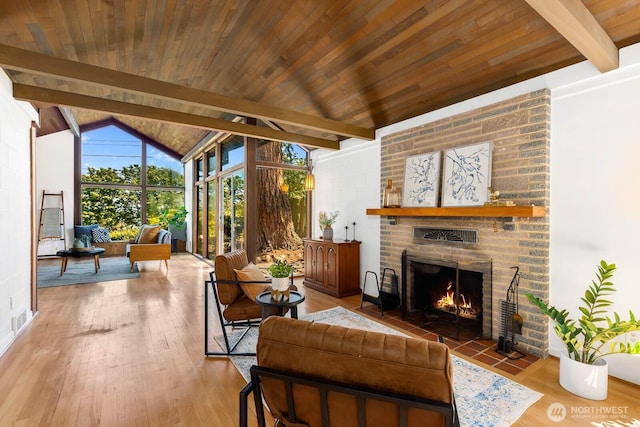 9539 Lake Shore Blvd NE, Seattle, WA 98115 - living room featuring a brick fireplace, wood finished floors, and wooden ceiling