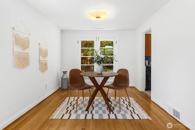 9539 Lake Shore Blvd NE, Seattle, WA 98115 - dining area featuring wood finished floors and baseboards