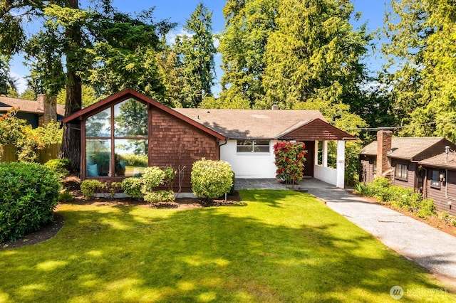 9539 Lake Shore Blvd NE, Seattle, WA 98115 - mid-century home featuring a front lawn and roof with shingles