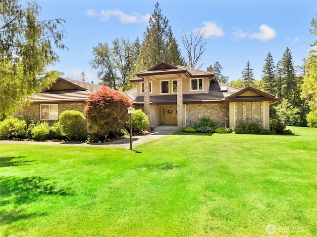 34214 102nd Ave S, Roy, WA 98580 - view of front of house with a chimney and a front lawn
