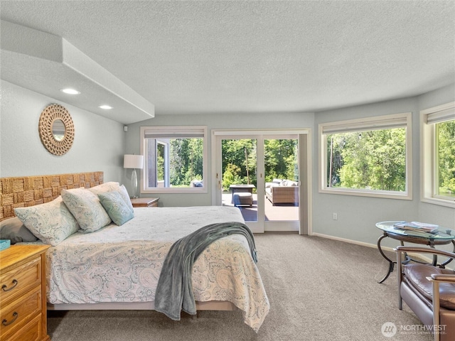 34214 102nd Ave S, Roy, WA 98580 - carpeted bedroom with access to outside, a textured ceiling, baseboards, recessed lighting, and french doors