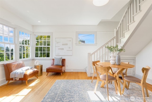 4340S Bennett, Seattle, WA 98118 - dining area with stairway, healthy amount of natural light, wood finished floors, and baseboards