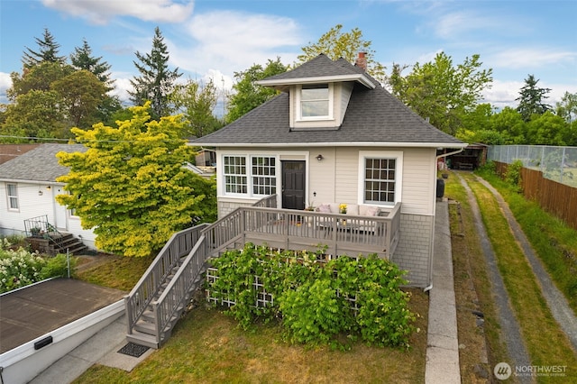 4340S Bennett, Seattle, WA 98118 - bungalow-style house featuring a shingled roof, stairway, a chimney, and a wooden deck
