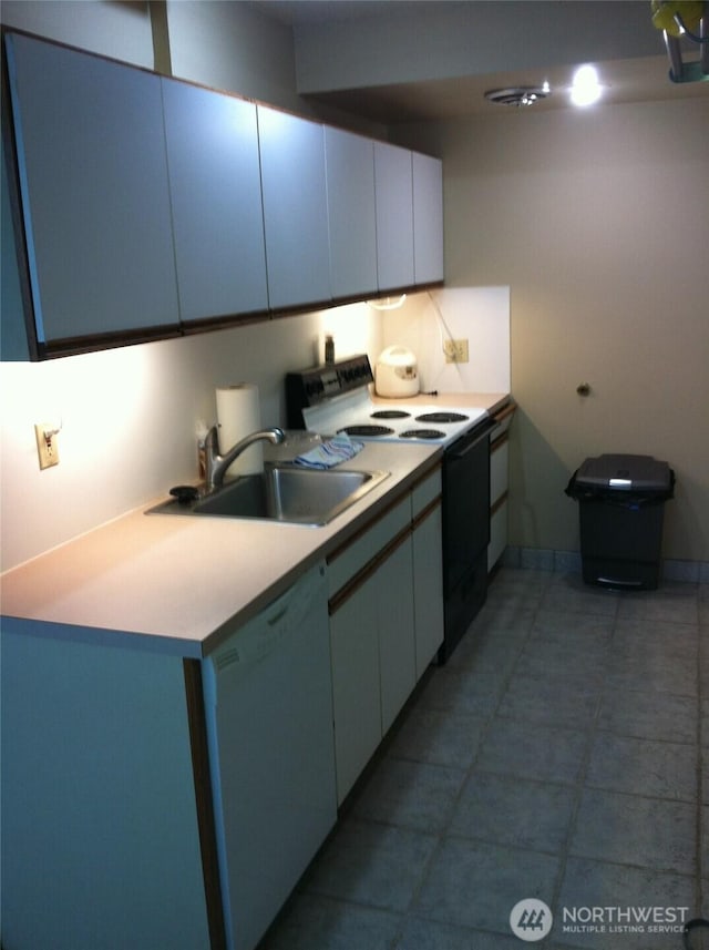 2513 13th Ave W, Seattle, WA 98119 - kitchen featuring dishwasher, electric range, light countertops, and tile patterned flooring