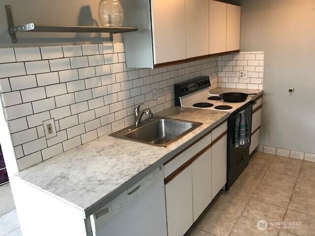 2513 13th Ave W, Seattle, WA 98119 - kitchen featuring electric stove, dishwasher, tasteful backsplash, and white cabinetry