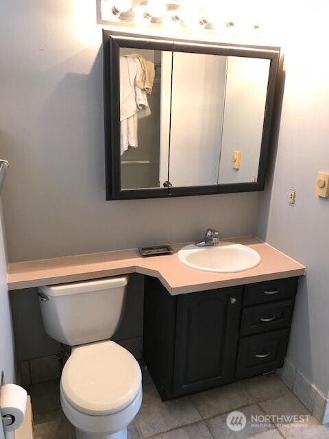 2513 13th Ave W, Seattle, WA 98119 - bathroom with vanity and tile patterned flooring