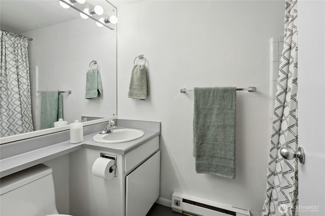 1000 Union St Unit 305, Seattle, WA 98101 - full bath featuring a baseboard radiator, vanity, and toilet
