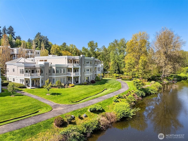 17432 Bothell Way NE Unit B302, Bothell, WA 98011 - surrounding community with a lawn and a water view