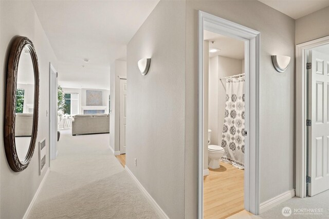 17432 Bothell Way NE Unit B302, Bothell, WA 98011 - corridor with light carpet