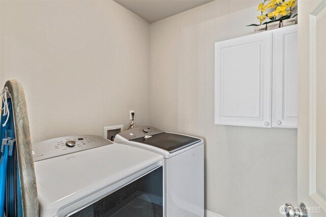 17432 Bothell Way NE Unit B302, Bothell, WA 98011 - washroom featuring washer and clothes dryer and cabinet space