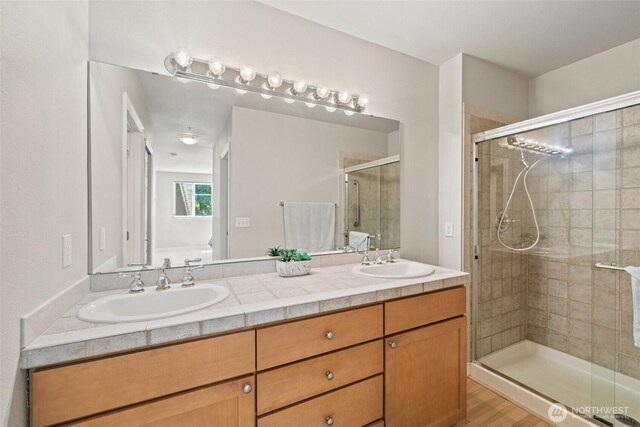 17432 Bothell Way NE Unit B302, Bothell, WA 98011 - full bath featuring a stall shower and double vanity