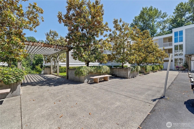 17432 Bothell Way NE Unit B302, Bothell, WA 98011 - view of property's community with a pergola and a patio area