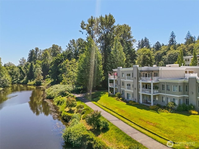 17432 Bothell Way NE Unit B302, Bothell, WA 98011 - surrounding community featuring a lawn and a water view