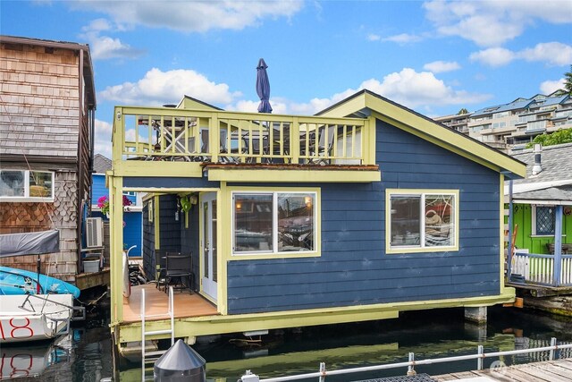 2420 Westlake Ave N Unit 11, Seattle, WA 98109 - rear view of house featuring a deck with water view