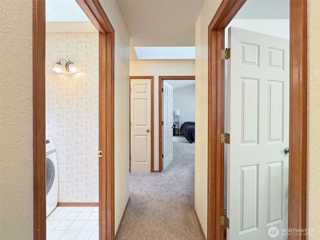42 Charles Way, Sequim, WA 98382 - hall with washer / clothes dryer and light carpet