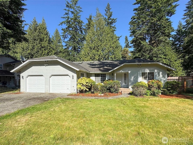 42 Charles Way, Sequim, WA 98382 - view of front of house with an attached garage and asphalt driveway
