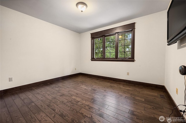 12925 206th Ave NE, Woodinville, WA 98077 - spare room featuring hardwood / wood-style flooring and baseboards